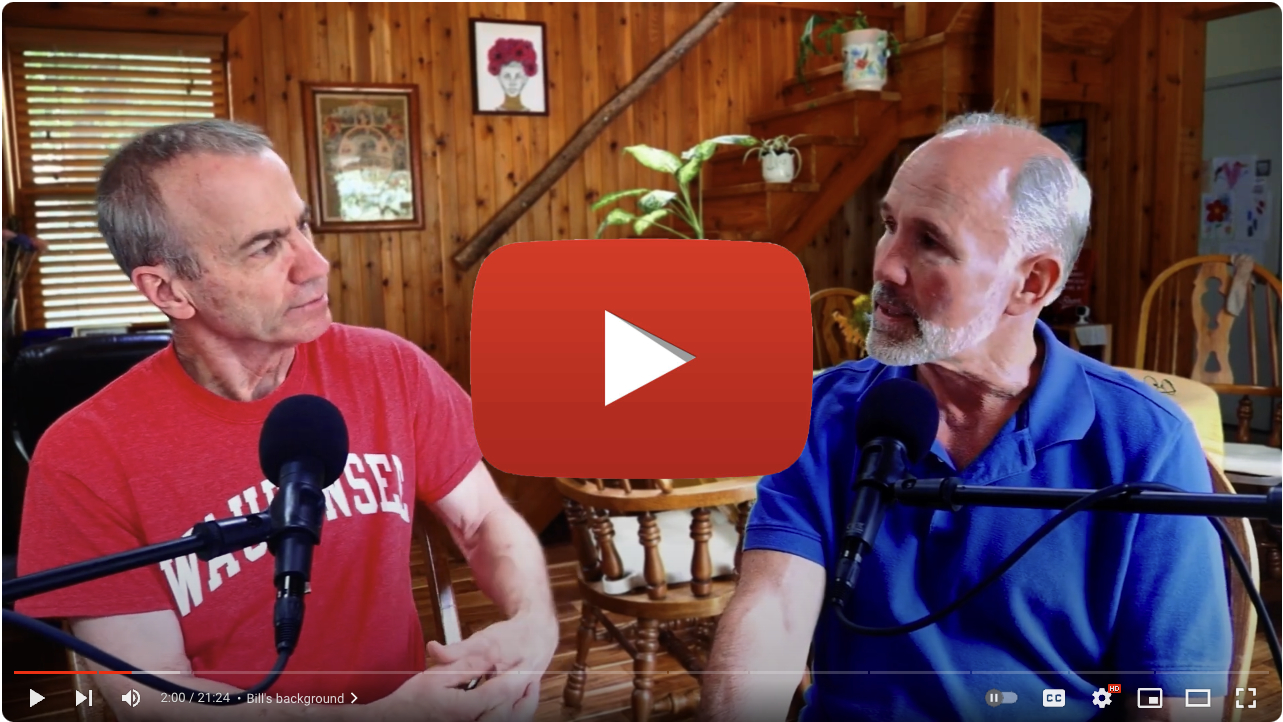 Jim Larson and Bill Warner are seated in Jim's home, with two microphones. They are looking at each other with thoughtful expressions.